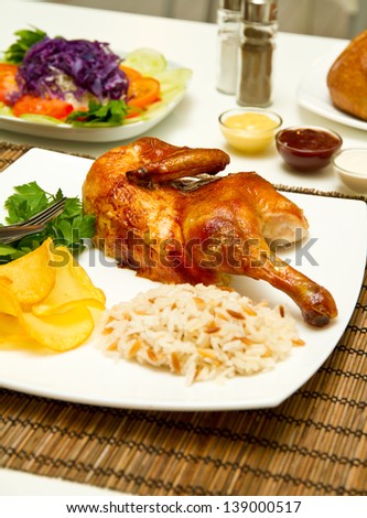 Charcoal baked chicken and side dishes