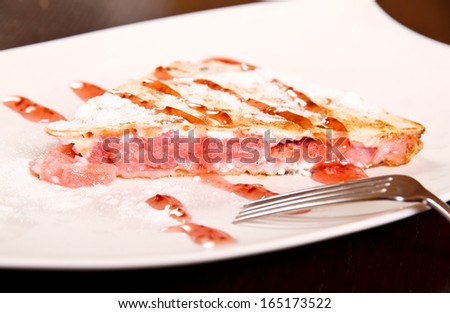 Berries pie slice on a plate