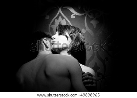 stock photo Half naked couple kissing