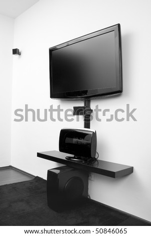 Home cinema system with flat screen tv