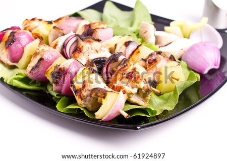 Cooked chicken and vegetables skewers
