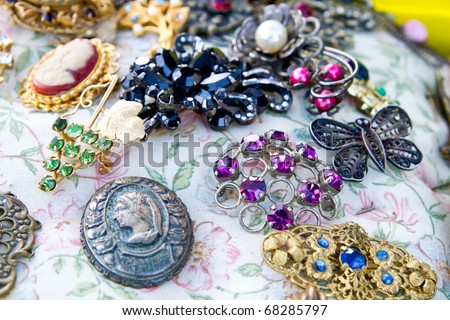 Vintage jewelry at the flea market (focus is on purple one, shallow dof)
