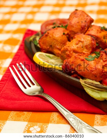 Indian chicken marinated in curry paste