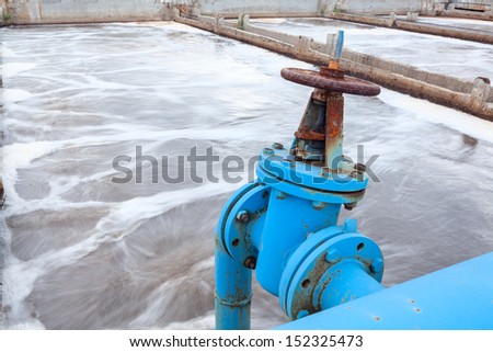Industrial tap with blue pipeline for oxygen blowing into sewage water