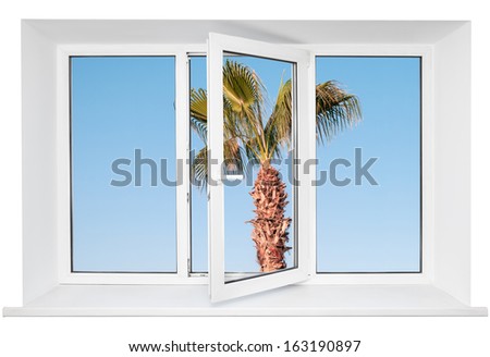 White plastic triple door window with palm tree on blue sky through glass. Isolated on white background. Opened door