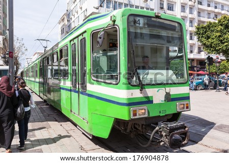 TUNIS CITY, TUNISIA - CIRCA MAY, 2012: City tramway is in the city. Public transport in the paramilitary capital