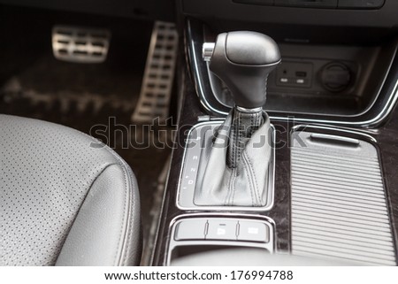 Gearshift lever of automatic gearbox. Car interior