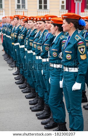 SAINT-PETERSBURG, RUSSIA - CIRCA MAY, 2011: Female forces of Ministry of Emergency Situations stand in line at the parade ground on May 9 in Victory Day.