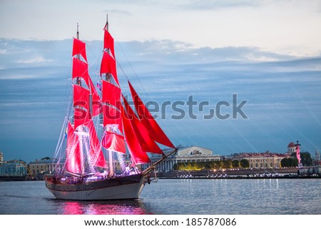 SAINT-PETERSBURG, RUSSIA - CIRCA JUNE, 2013: The Scarlet Sails show during the White Nights Festival. Ship passing Neva river as a symbol of the end of school year