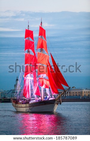 SAINT-PETERSBURG, RUSSIA - CIRCA JUNE, 2013: Celebration of Scarlet Sails show during the White Nights Festival. Ship passing Neva river as a symbol of the end of school year