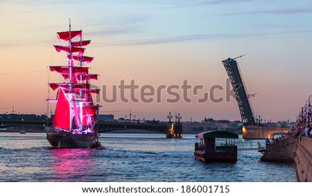 SAINT-PETERSBURG, RUSSIA - CIRCA JUNE, 2013: Sailing ship with Scarlet Sails pass trough the Troitsky bridge at White Nights. Panorama
