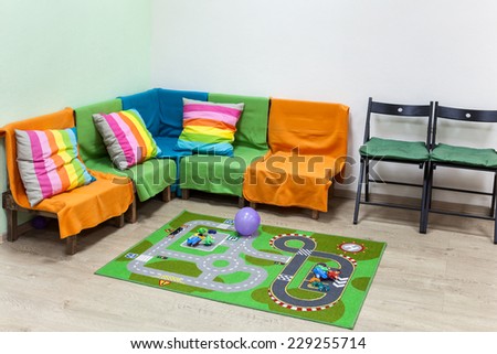 Children\'s corner in the large living room, simple interior