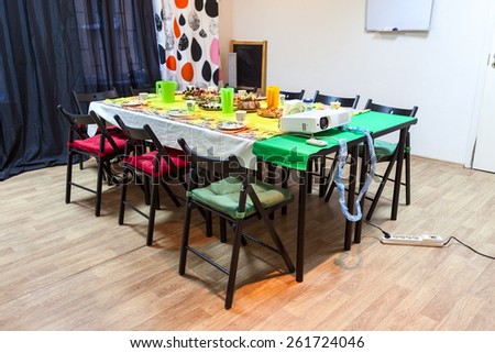 Table with cold snacks in the room to celebrate a birthday or children party