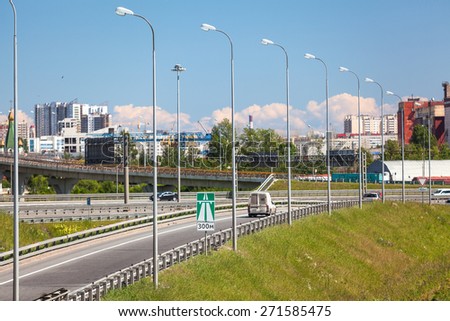 SAINT-PETERSBURG, RUSSIA - CIRCA JULY, 2014: Car drives on exit to the Saint-Petersburg city encircling highway. The federal public ringroad around the city