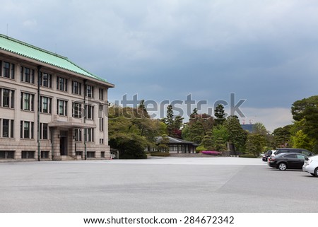 TOKYO, JAPAN - CIRCA APR, 2013: Car parking area is near Imperial Household Agency building at inner area of Tokyo Imperial Palace. Tokyo Imperial Palace is the main residence of the Emperor of Japan