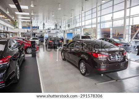 ST. PETERSBURG, RUSSIA - CIRCA APR, 2015: Hyundai Elantra car stands in auto dealership showroom. The Rolf Lahta is a official dealer of Hyundai