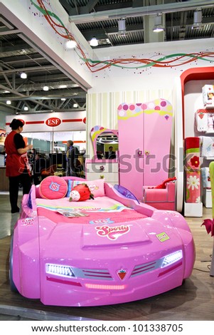 MOSCOW-MAY 18: Kids room car bed at the international exhibition of professional furniture EEM Euroexpofurniture on May 18, 2011 in Moscow