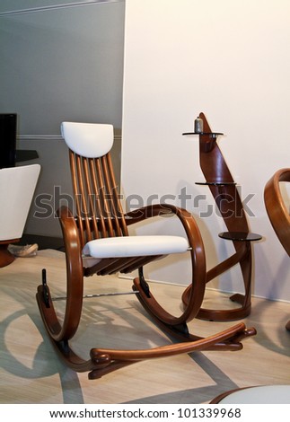 MOSCOW-MAY 18: Rocking chair at the international exhibition of professional furniture EEM Euroexpofurniture on May 18, 2011 in Moscow
