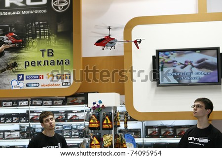 MOSCOW - MARCH 16: Mini RC helicopter toy flies presented at the International Toy Specialized Exhibition March 16, 2011 in Moscow