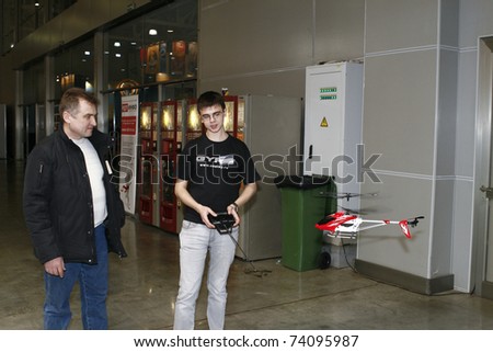 MOSCOW - MARCH 16: Mini RC helicopter toy flies presented at the International Toy Specialized Exhibition March 16, 2011 in Moscow