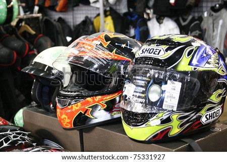 MOSCOW - APRIL 1: Motorbike helmets at the Moscow specialized Exhibition  of motor cycling industry in Russia on April 1, 2011 in Moscow, Russia