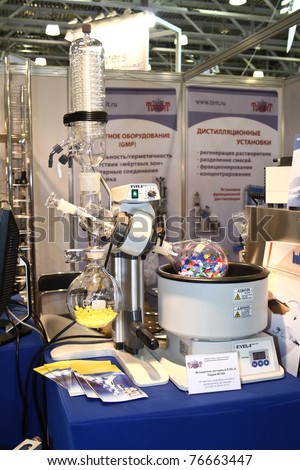 MOSCOW - APRIL 28: EYELA rotary evaporator with integrated heating bath at the international exhibition of analytical and laboratory equipment in Russia and CIS on April 28, 2011 in Moscow, Russia.