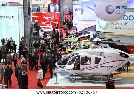 MOSCOW - MAY 19: The pavilion and the exhibition visitors at the international exhibition of  the helicopter industry, HeliRussia on May 19, 2011 in Moscow