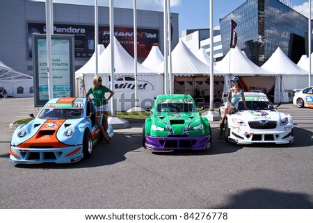 MOSCOW - AUGUST 25: Megafon mitjet race autos at the international exhibition of  the auto and components industry, Interauto on August 25, 2011 in Moscow