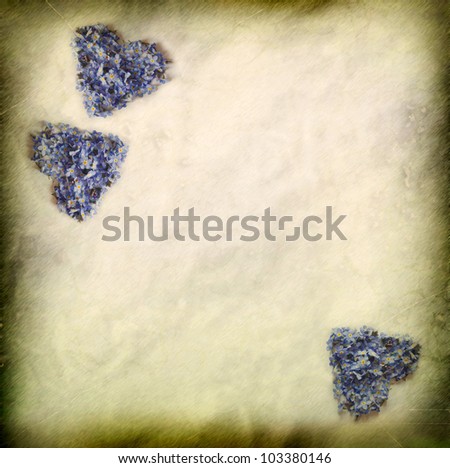 Background paper texture and forget-me-not hearts