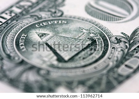 back of the one dollar bill: the pyramid, shallow depth of field