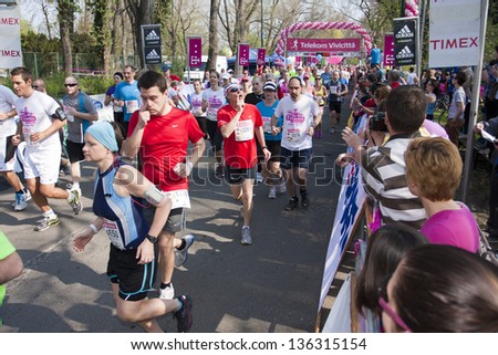 BUDAPEST, HUNGARY - APRIL 21: unidentified marathon runners starting from the start at 28th Telekom VivicittÃ?Â¡ Pro City Run on April 21, 2013 in Budapest, Hungary
