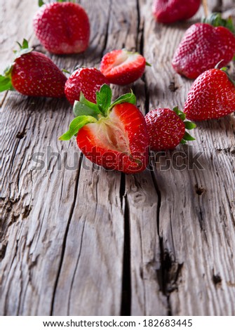 Fresh strawberries on wooden table. Fresh Berry on wooden table. Garden fruits. Organic