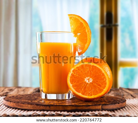 Fresh juice, mix fruits, orange drink with window background