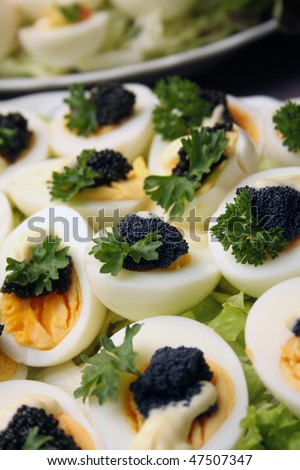 eggs with caviar on a cold buffet
