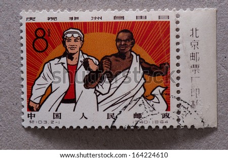 CHINA - CIRCA 1964:A stamp printed in China shows image of Celebrating African Freedom Day,circa 1964