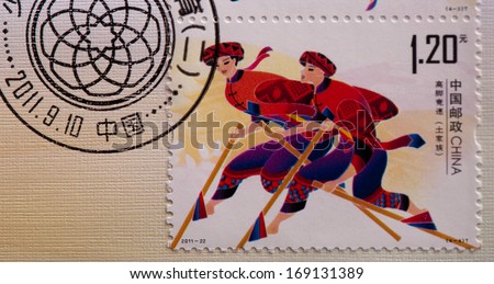 CHINA - CIRCA 2011:A stamp printed in China shows image of Traditional Sport of Minority,circa 2011