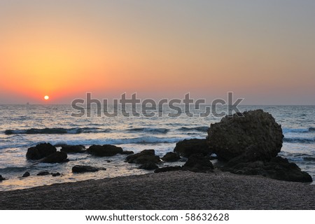 Mediterranean coast in the evening and the setting sun.