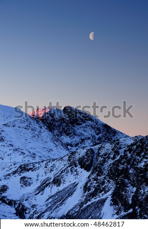 Moon and dawn light on Scafell, English Lake District