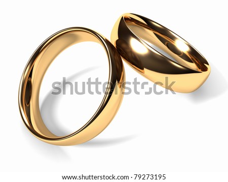 stock photo Two gold wedding rings together white background