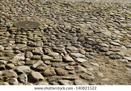 Strong  natural cobbled road.