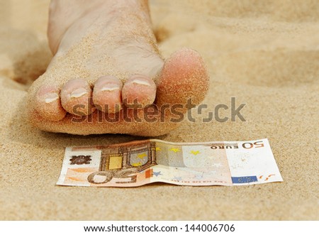 Man leg with long nails and fifty euro.