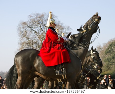 LONDON, UK -MARCH 9: Members of the Queen\'s Horse Guard on duty. Horse Guards Parade, London on March 9,  2014.