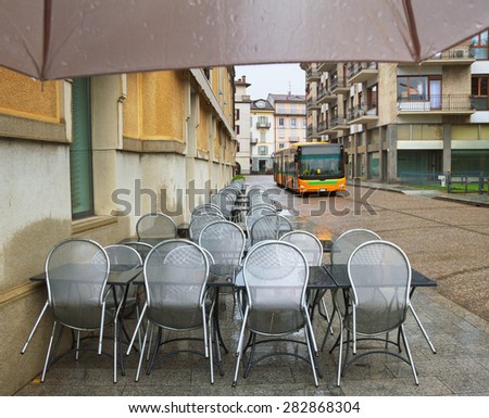 Closed cafe in rain time, Italy.