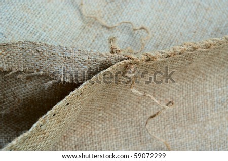 Open jute bag with thread.