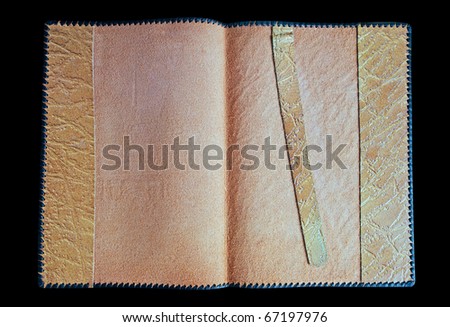 Opened leather book`s and document`s cover with strip.