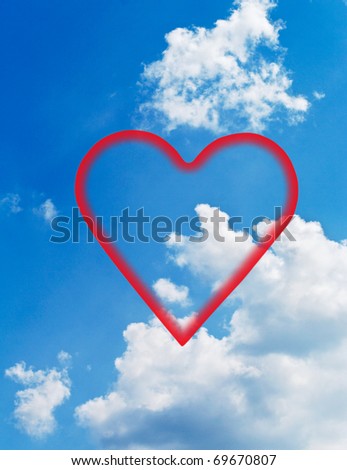 Fluffy clouds in the blue sky and  fake red hearts.