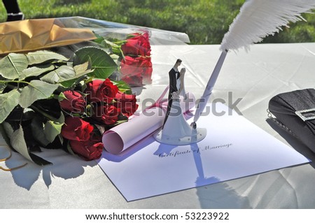 Marriage certificate with red roses