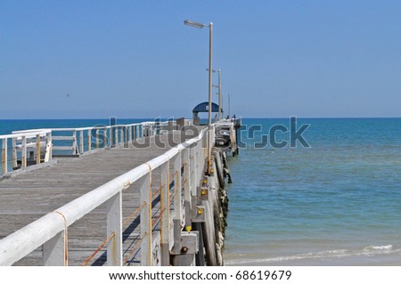 Long wooden jetty at the ocean. Australia