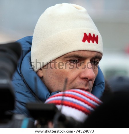BOLOTNAYA SQUARE, MOSCOW, RUSSIA - FEBRUARY 04: Michael Prohorov, the candidate for presidents of Russia, is going to the opposition meeting on February 04, 2012 in Bolotnaya square, Moscow, Russia.