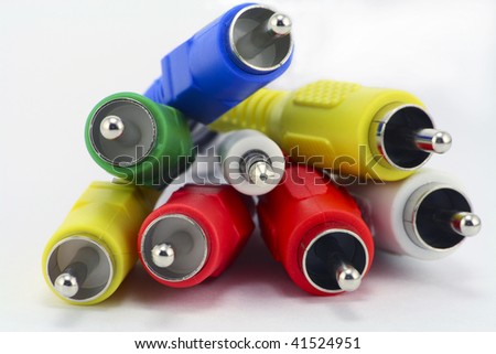 Dark blue, green, yellow, white and red RCA connectors for switching audio and video signals in modern electronic equipment